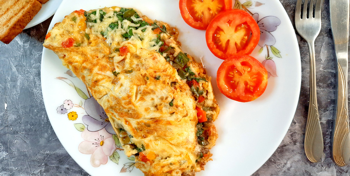 Indian Masala Omelet: A vibrant, flavorful breakfast dish featuring a medley of spices and fresh ingredients