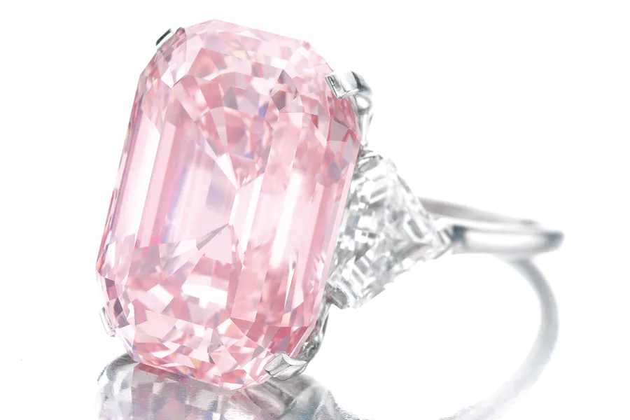 The Graff Pink Diamond surrounded by other luxury jewelry, emphasizing its standout beauty.