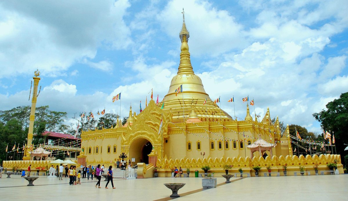 Peaceful landscape of Lumbini with monasteries and stupas.