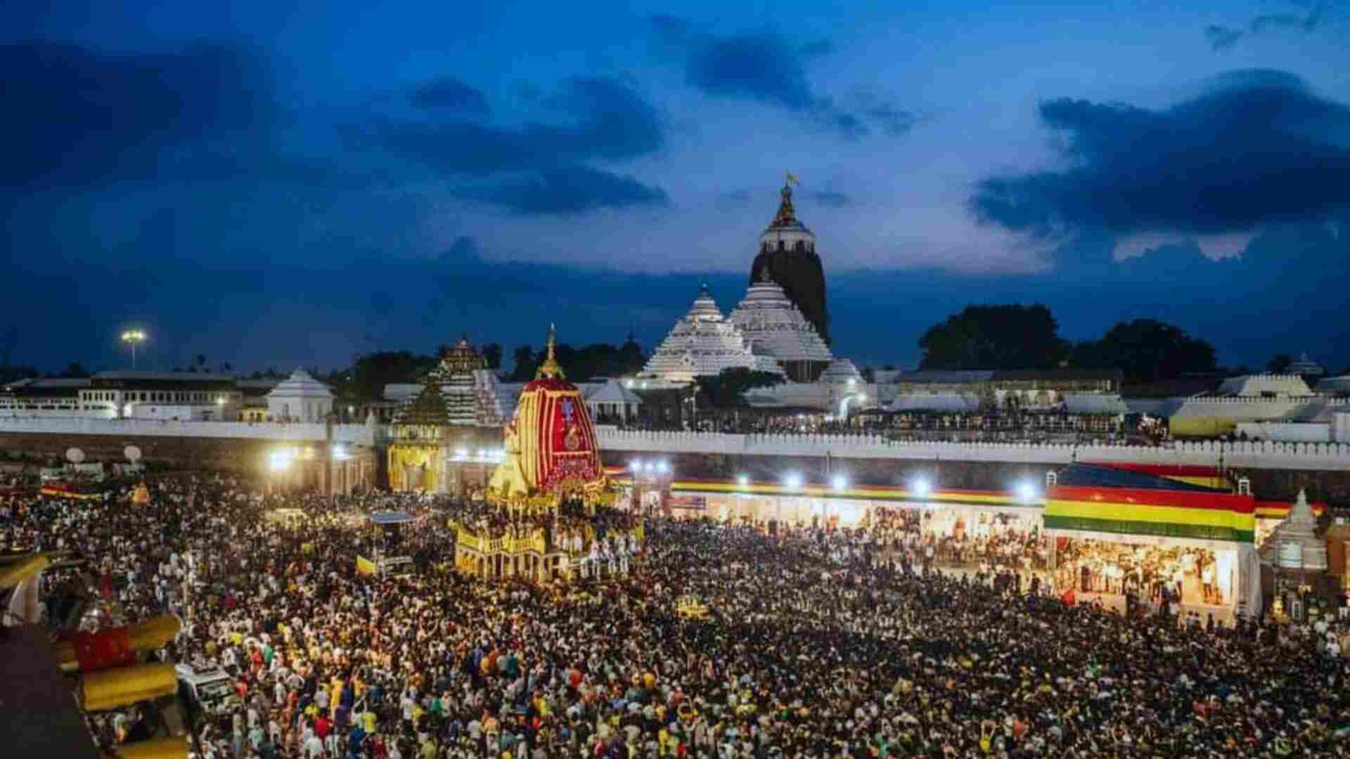 Devotees pulling the chariots of Lord Jagannath, Balabhadra, and Subhadra during Rath Yatra 