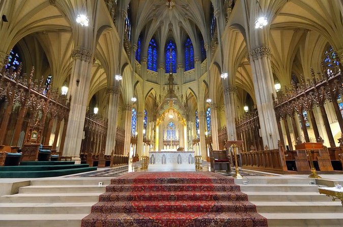 The towering spires of St. Patrick's Cathedral rising above Midtown Manhattan. 