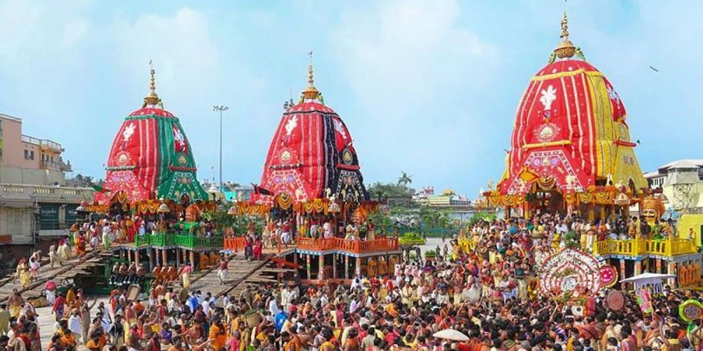 Traditional Gotipua dancers performing in front of the chariots during Rath Yatra 